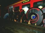 Sprayer beschmierten abgestellte Züge